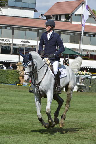 Spruce-Meadows-9-8-13-2722-DanielDeusser-CornetDAmour-GER-DDeRosaPhoto