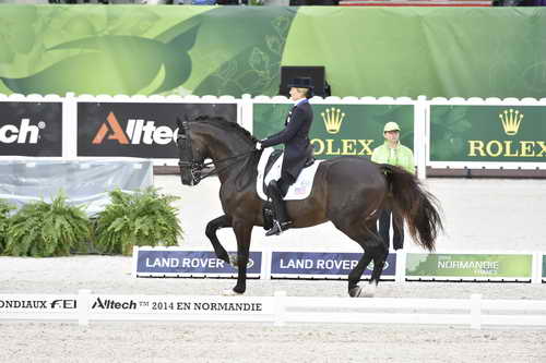 WEG-Dressage-8-25-14-GPTeam-0003865-TinaKonyot-CalectoV-USA-DDeRosaPhoto