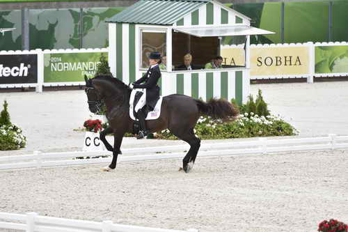 WEG-Dressage-8-25-14-GPTeam-0003878-TinaKonyot-CalectoV-USA-DDeRosaPhoto