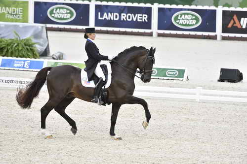 WEG-Dressage-8-25-14-GPTeam-0003883-TinaKonyot-CalectoV-USA-DDeRosaPhoto