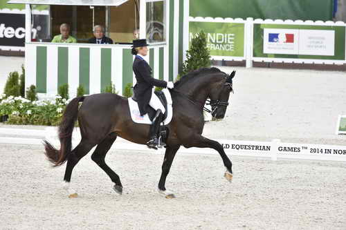 WEG-Dressage-8-25-14-GPTeam-0003885-TinaKonyot-CalectoV-USA-DDeRosaPhoto