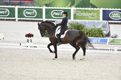 WEG-Dressage-8-25-14-GPTeam-0003897-TinaKonyot-CalectoV-USA-DDeRosaPhoto