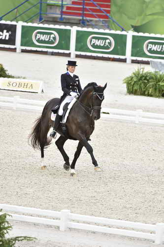 WEG-Dressage-8-25-14-GPTeam-0003905-TinaKonyot-CalectoV-USA-DDeRosaPhoto