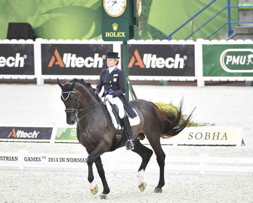 WEG-Dressage-8-25-14-GPTeam-0003927-TinaKonyot-CalectoV-USA-DDeRosaPhoto