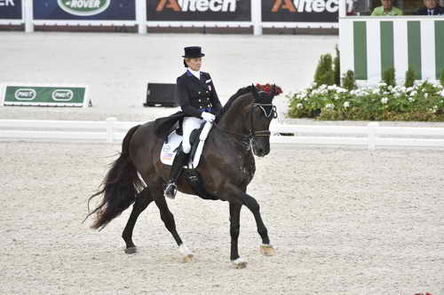 WEG-Dressage-8-25-14-GPTeam-0003946-TinaKonyot-CalectoV-USA-DDeRosaPhoto