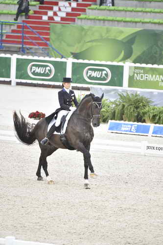 WEG-Dressage-8-25-14-GPTeam-0003957-TinaKonyot-CalectoV-USA-DDeRosaPhoto