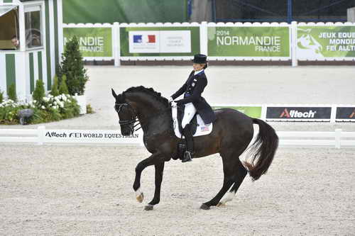 WEG-Dressage-8-25-14-GPTeam-0003969-TinaKonyot-CalectoV-USA-DDeRosaPhoto