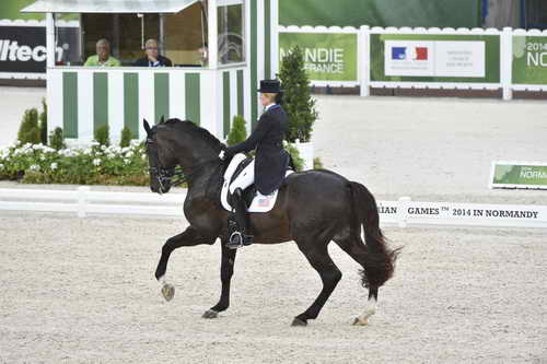 WEG-Dressage-8-25-14-GPTeam-0003974-TinaKonyot-CalectoV-USA-DDeRosaPhoto