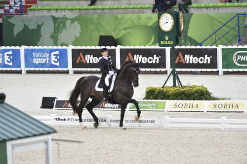 WEG-Dressage-8-25-14-GPTeam-0003975-TinaKonyot-CalectoV-USA-DDeRosaPhoto