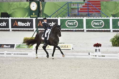 WEG-Dressage-8-25-14-GPTeam-0003976-TinaKonyot-CalectoV-USA-DDeRosaPhoto