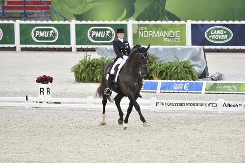 WEG-Dressage-8-25-14-GPTeam-0003977-TinaKonyot-CalectoV-USA-DDeRosaPhoto