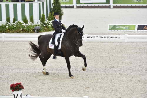 WEG-Dressage-8-25-14-GPTeam-0003981-TinaKonyot-CalectoV-USA-DDeRosaPhoto