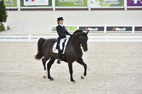 WEG-Dressage-8-25-14-GPTeam-0003982-TinaKonyot-CalectoV-USA-DDeRosaPhoto