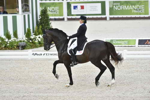 WEG-Dressage-8-25-14-GPTeam-0003993-TinaKonyot-CalectoV-USA-DDeRosaPhoto