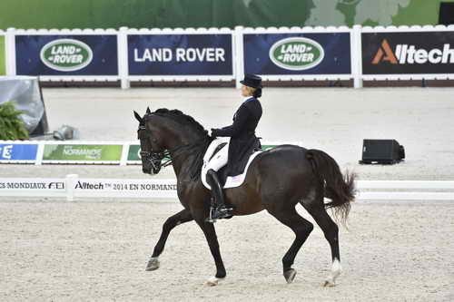 WEG-Dressage-8-25-14-GPTeam-0003995-TinaKonyot-CalectoV-USA-DDeRosaPhoto