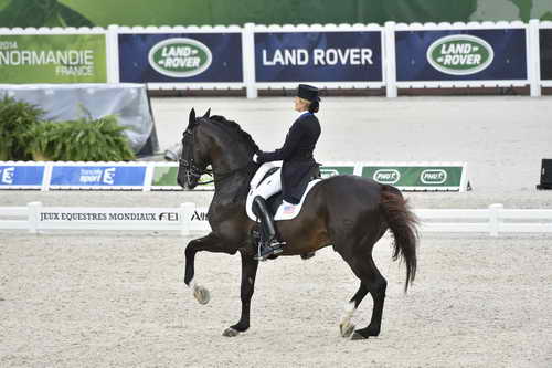 WEG-Dressage-8-25-14-GPTeam-0003996-TinaKonyot-CalectoV-USA-DDeRosaPhoto