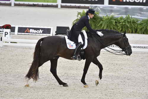 WEG-Dressage-8-25-14-GPTeam-0004012-TinaKonyot-CalectoV-USA-DDeRosaPhoto