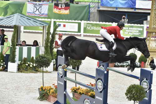WEG1-SJ-Team2-9-4-14-0003037-BeezieMadden-CortesC-USA-DDeRosaPhoto