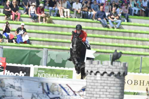 WEG2-SJ-Team1-9-3-14-0000200-BeezieMadden-CortesC-USA-DDeRosaPhoto