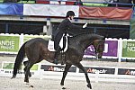 WEG-Dressage-8-25-14-GPTeam-0006095-AdrienneLyle-Wizard-USA-DDeRosaPhoto